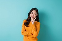 Smiling woman in yellow sweater