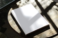 Blank book on wooden table