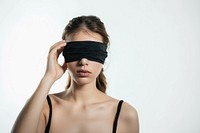 Blindfolded woman in black attire