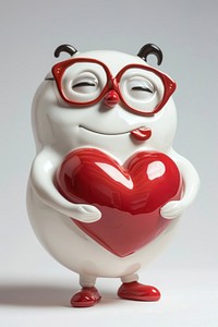 Cute figurine holding heart