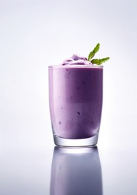 A glass of Blueberry Smoothie smoothie beverage dessert.