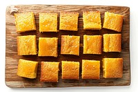 Golden cornbread squares on board