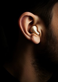 Earbud in human ear closeup