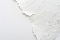 Textured torn white paper background