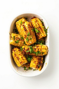 A dish of roasted corn pineapple produce grain.