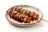 Grilled chicken skewers with sauce