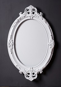 Elegant ornate white oval mirror