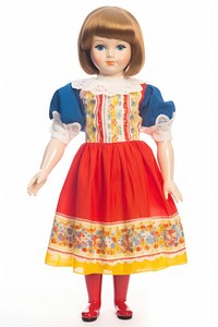 Vintage doll in traditional dress