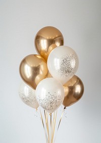 Elegant gold white balloons celebration