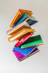 Colorful books floating midair