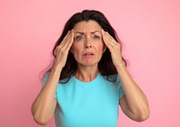 Woman stressed pink background