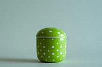 Green polka dot ceramic jar