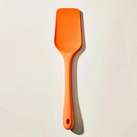 Bright orange silicone kitchen spatula