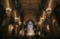 Interior of a catholic church, blurry background image