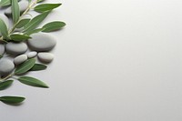 Minimalist zen background pebble medication herbal.