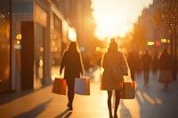 People walking along the street person city bags.