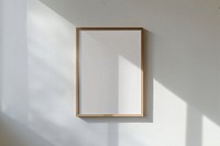 Minimalist empty wooden picture frame