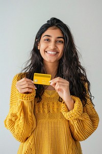 Smiling woman holding credit card