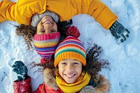 Lay on snow floor portrait photo happy.