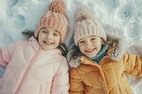 Lay on snow floor portrait happy photo.