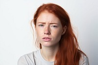 Pensive redhead woman portrait