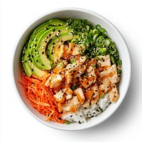 A chicken poke bowl with slice avocado on a white bowl sesame slices food.