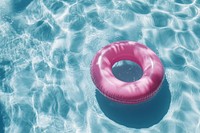 Pink inflatable ring swimming water pool.