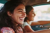 Joyful friends driving together