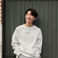 Smiling man wearing casual sweatshirt mockup