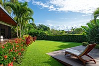 Modern house backyard chair lawn vegetation.