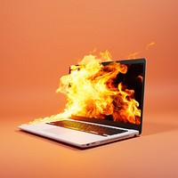 Burning laptop fire electronics computer.