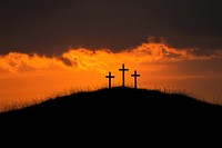 Three Crosses crosses silhouette sunset.