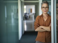 Business woman wearing glasses business office smile.