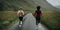 Runners on mountain road