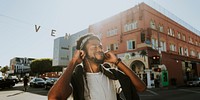 Man enjoying music outdoors