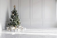 White wall with a Christmas tree christmas minimalist interior.