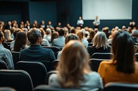 Business conference or presentation audience professional people.