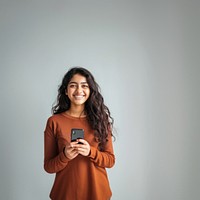 Young indian girl happy smile phone.