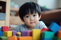 Young kid playing with blocks photography toys development.