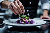 Decorating main dish purple chef's plate.