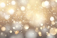 Golden lights with a bokeh effect background abstract celebration.