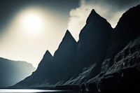 Photography of landscape mountain with lake on white sky outdoors sunlight scenery.