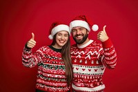 Couple wearing christmas red ugly Sweaters sweaters happy background.