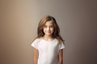 A young girl wearing a white T-shirt photography background portrait.