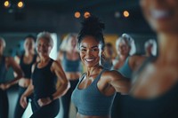 A smiling asian black woman dancing at the gym women lifestyle exercise.