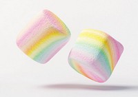 Two pastel-colored rainbow marshmallows floating sweets colors.