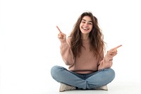 Happy young woman sitting fingers background pointing.