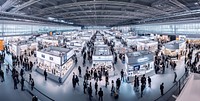 A large exhibition hall display people person.