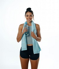 Woman smiling and holding sport bottle fitness water towel.