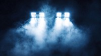 Stadium lights and smoke spotlight lighting outdoors.